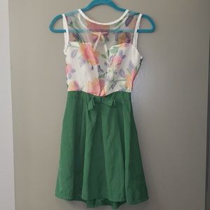 Adorable mini dress with sheer floral top